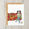 Greeting Card - Person Knitting Sitting on a Colorful Couch
