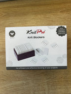 Knit Pro knit blockers packaging on a wooden surface