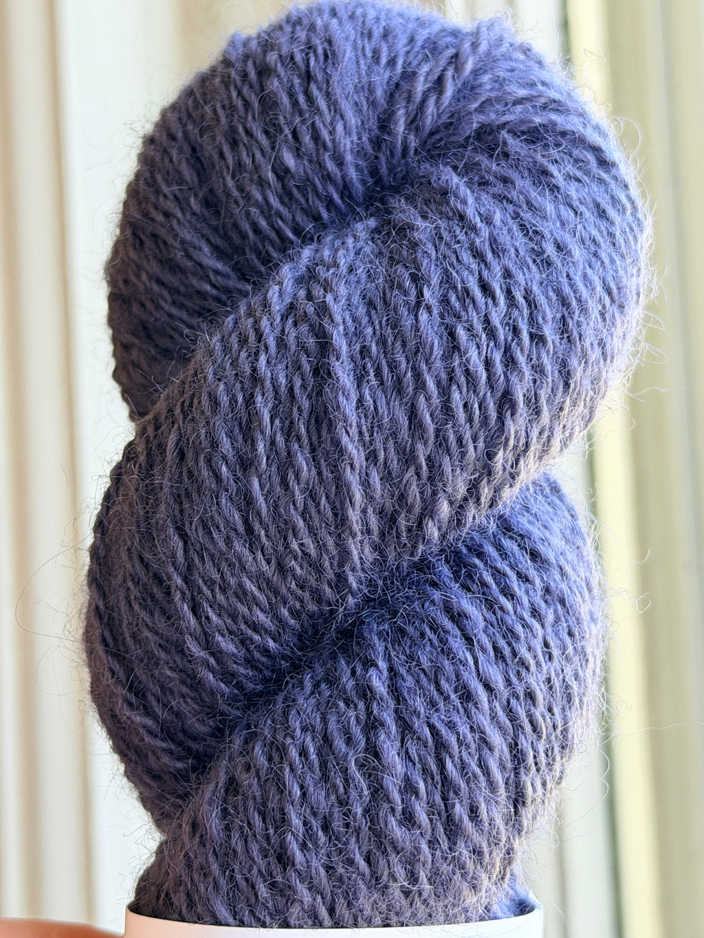 Close up of blue skein of yarn.