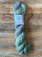 Yarn hank in green and lavendar gray