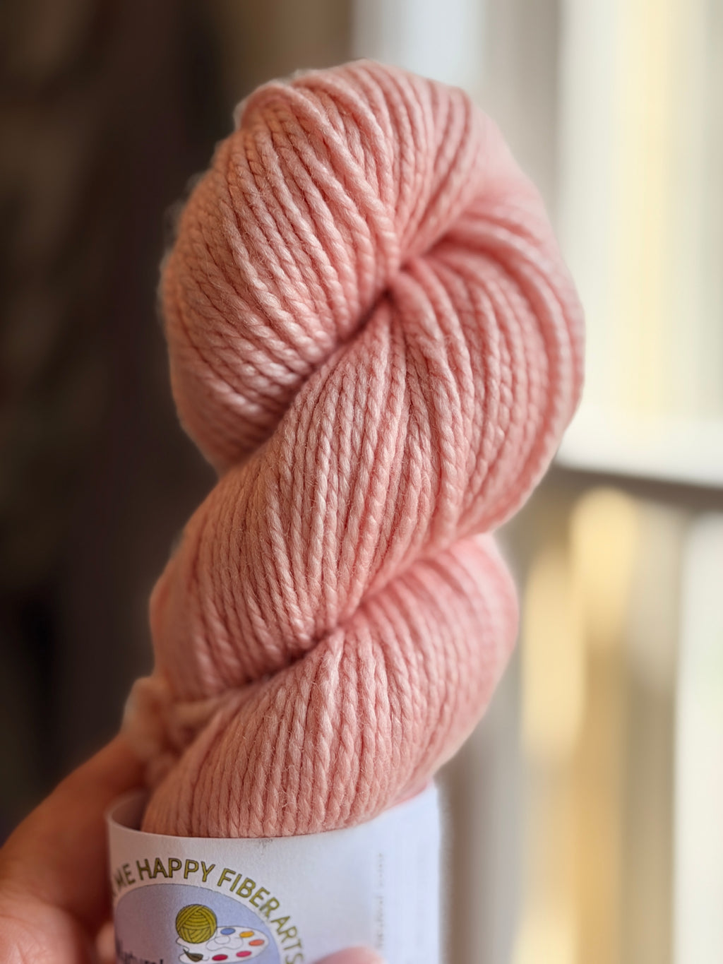 Light pink yarn in natural light