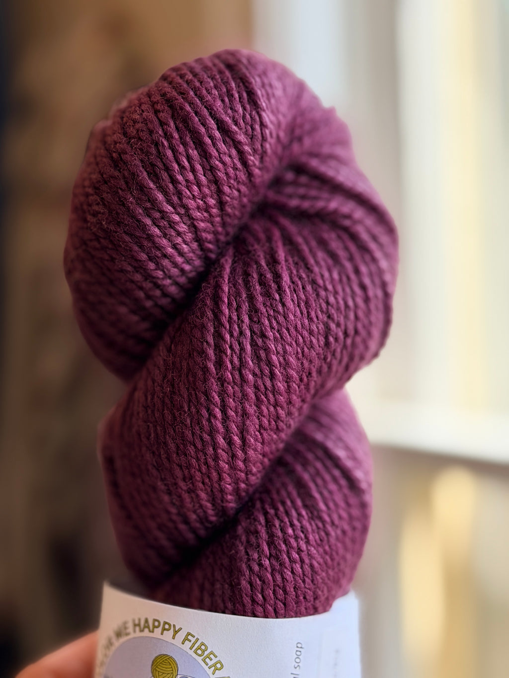 Purple yarn in natural light