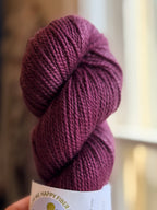 Purple yarn in natural light