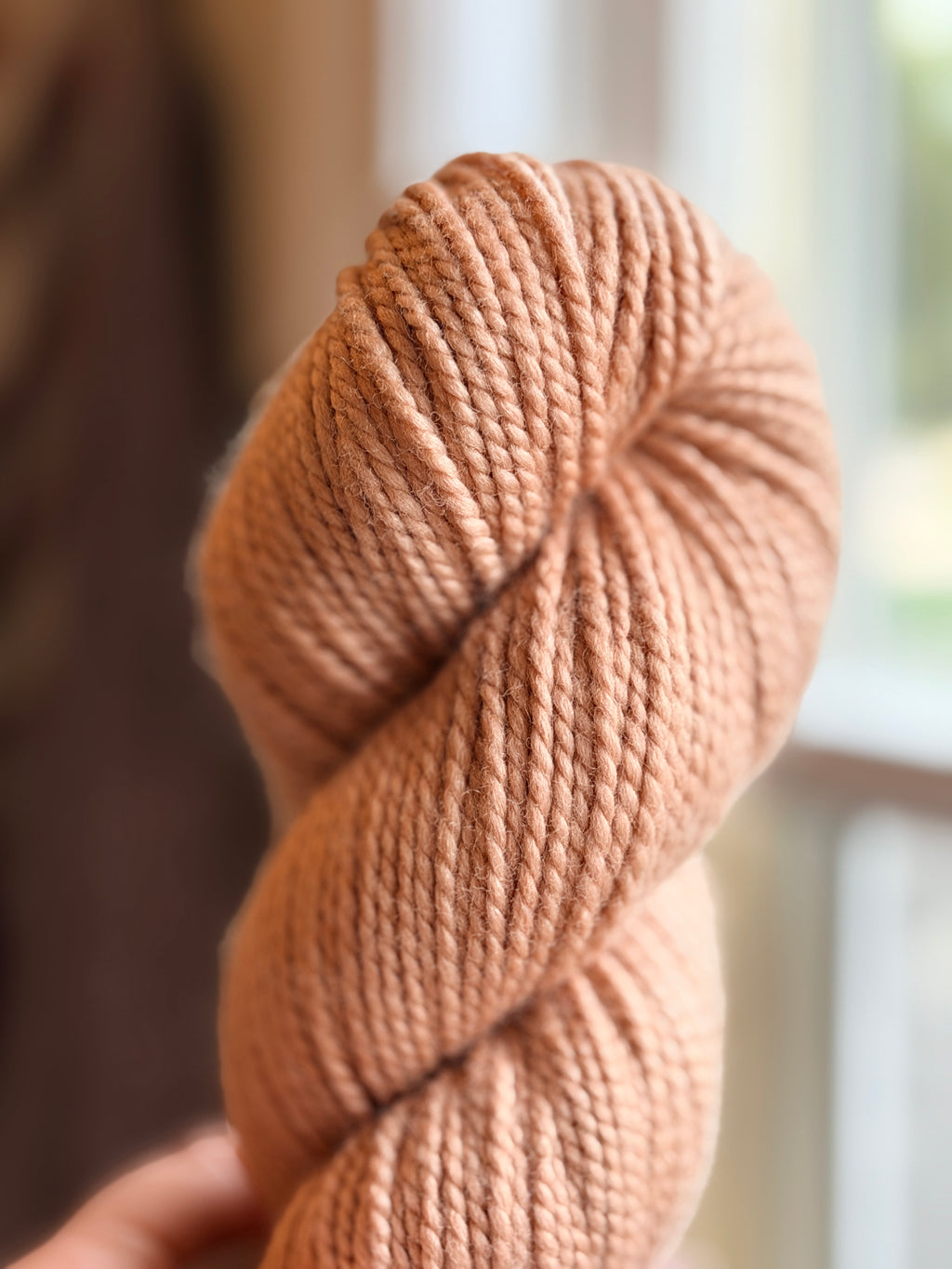 Beige yarn in natural light