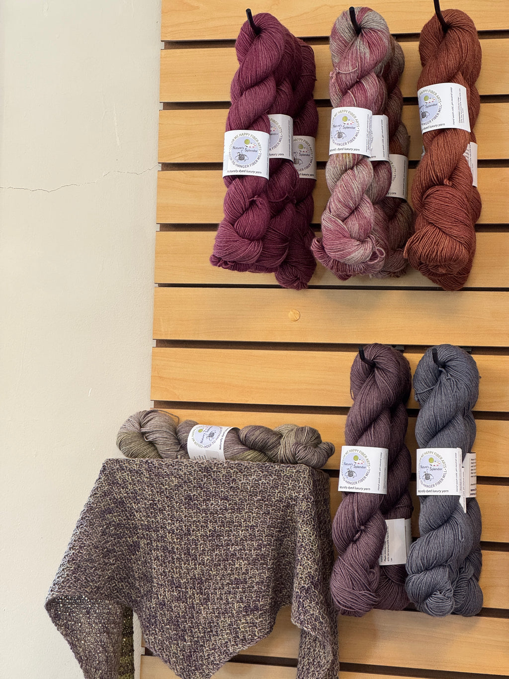 A lifestyle display photo of Color Me Happy Fiber Arts Studio Nature's Splendor Yak Sock weight yarn